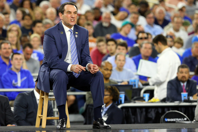 Illustration for article titled Eight Photos Of Coach K Sitting On A Lil' Stool